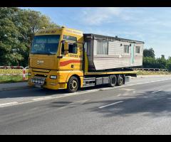 Transport niskopodwoziowy wózków widłowych Poznań - 6/12