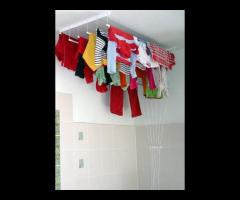 Monter suszarek sufitowych do suszenia ubrań. - 6/16