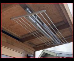 Monter suszarek sufitowych do suszenia ubrań. - 12/16