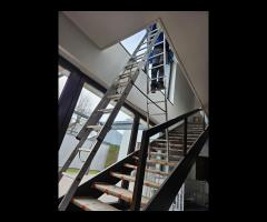 Mycie okien antresoli witryn sklepowych przeszkleń daszków fasad - 9/11